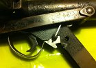 IMG 1552  Mit dem Schweißpunkt ist die Abzugseinheit gegen Ausbauen gesichert. / The trigger group is welded at the grip to prevent removing it.